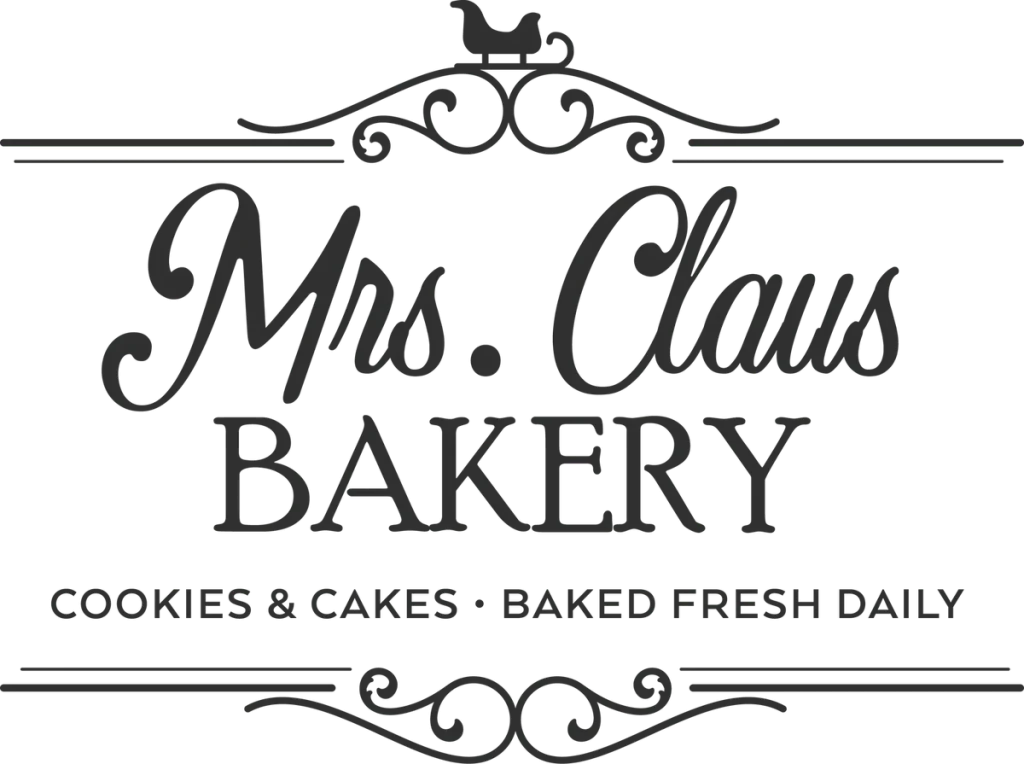 Mrs. Claus BAKERY COOKIES and CAKES BAKED FRESH DAILY in dark gray between scrolled rules with a sleigh