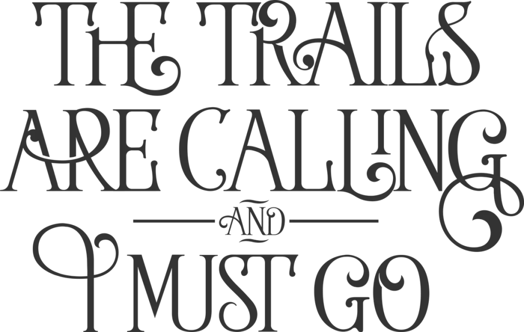 THE TRAILS IS CALLING AND I MUST GO in dark gray curly capitals
