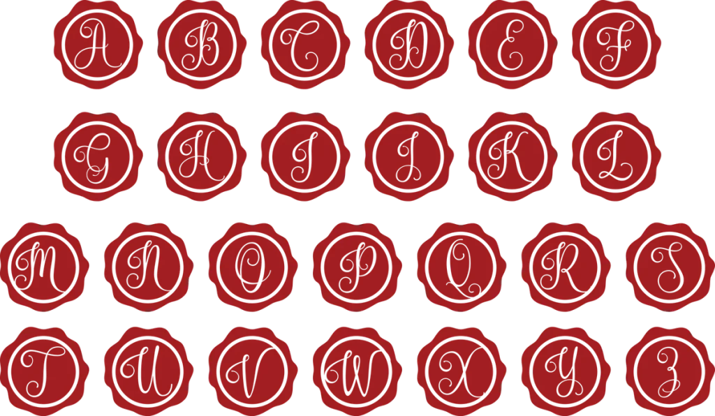 26 red wax seals each with a script initial from A to Z